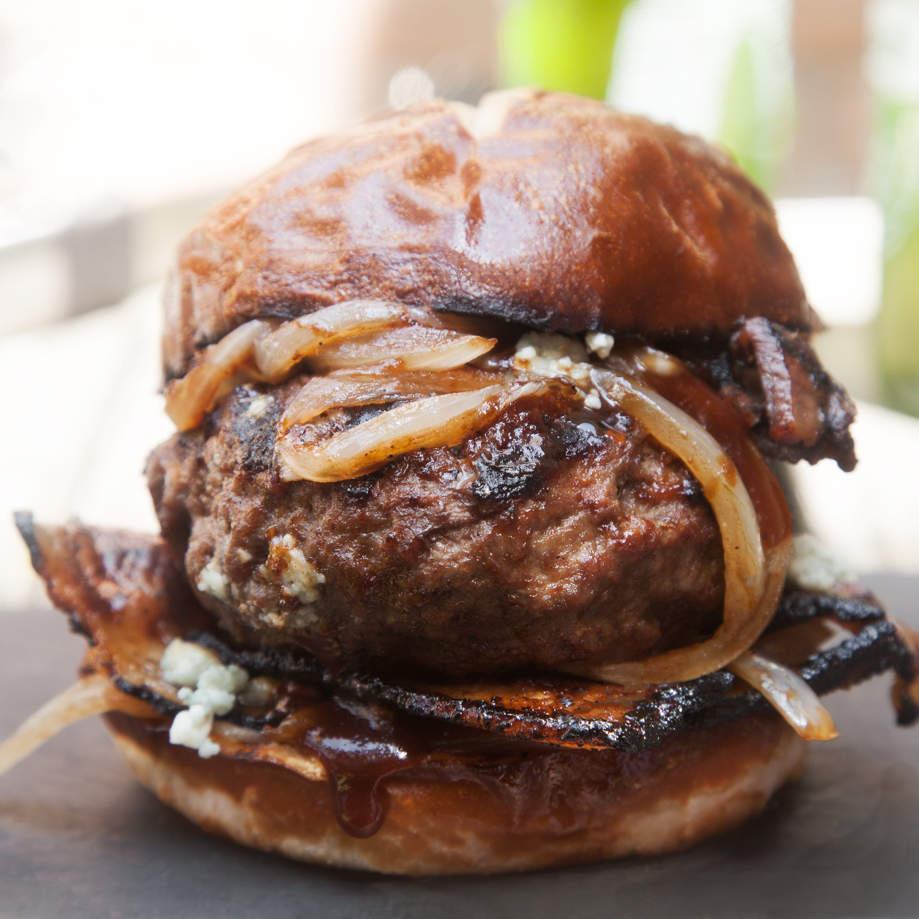 Grilled Bacon Burgers with Caramelized Onions and Blue Cheese